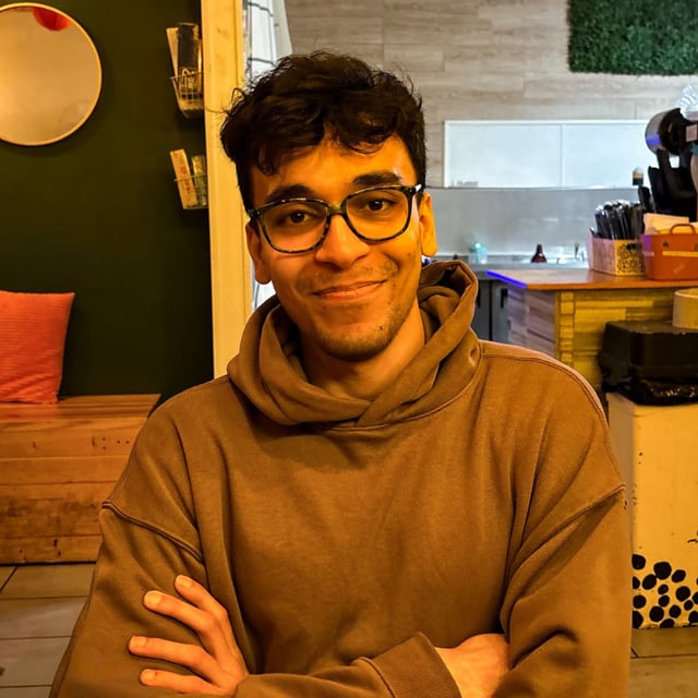 Portrait of Naqi, software developer